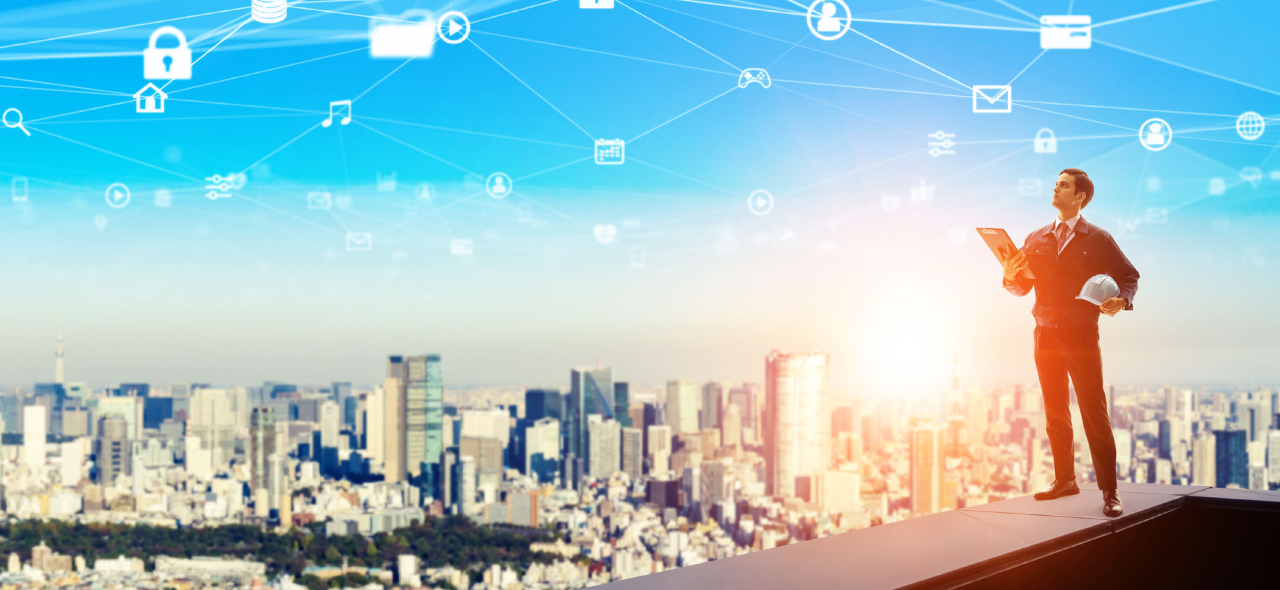 都会のビル群と工事職員